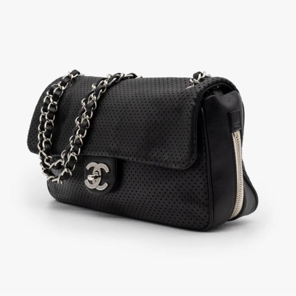 ••SOLD••. CHANEL Bag is crafted from black perforated lambskin leather